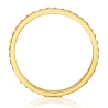 Złoty pierścionek z obrączka kamieniami