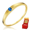 Złoty pierścionek niebieski kamień Obrączka