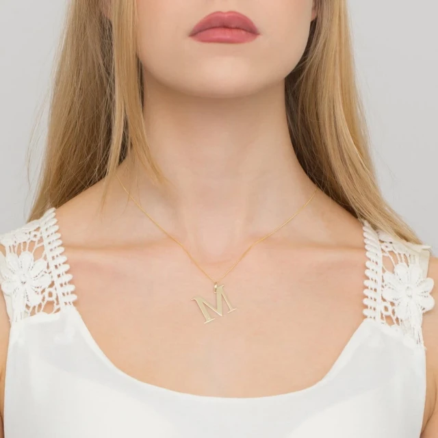 Gold Celebrity Sample 585 (14k) Großer M Diamant