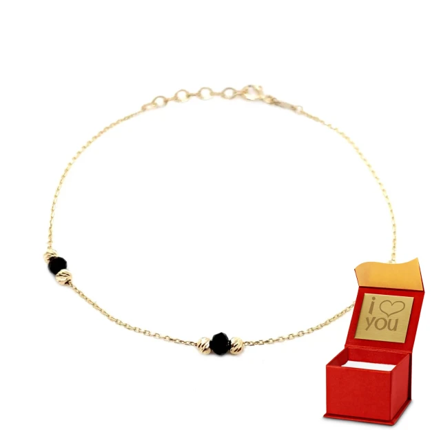 Armband mit sechs goldenen Diamantkugeln und drei schwarzen Steinen