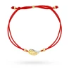Bransoletka skrzydełko z cyrkoniami na czerwonym sznurku