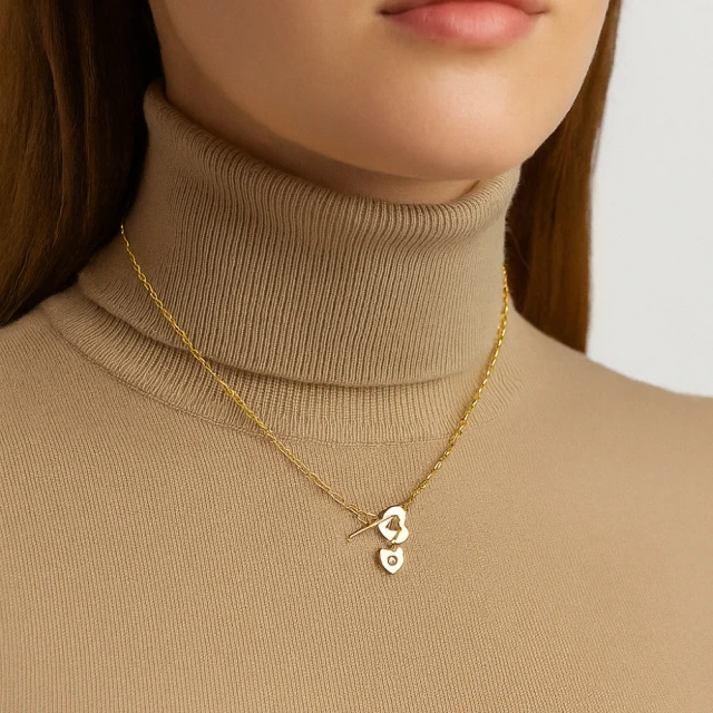 Pozłacany naszyjnik dwa serca cyrkonia