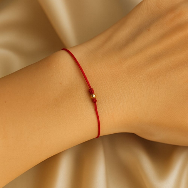 copy of Złota bransoletka sznurkowa na dłoń Kółko z gwiazdką