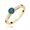 Złoty pierścionek próby 375 z ciemnoniebieskim topazem London Blue 0,50 ct i 10 diamentami