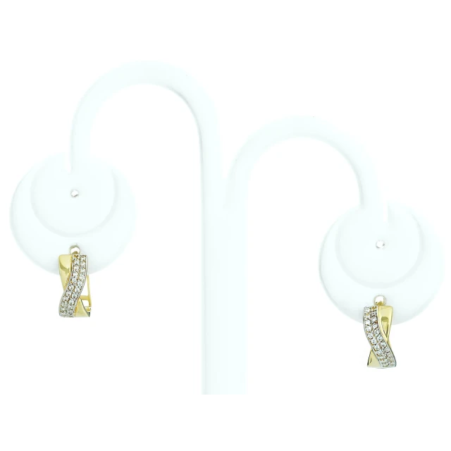 Goldene Ohrringe, durchsetzt mit Wellenzikonen